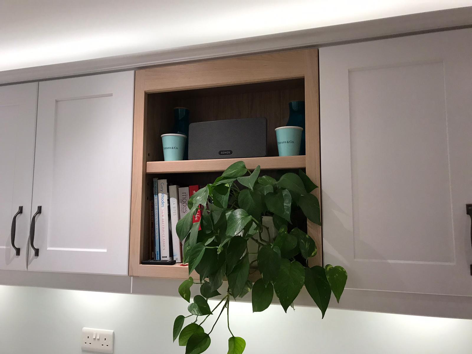 Oak feature in wall cabinets